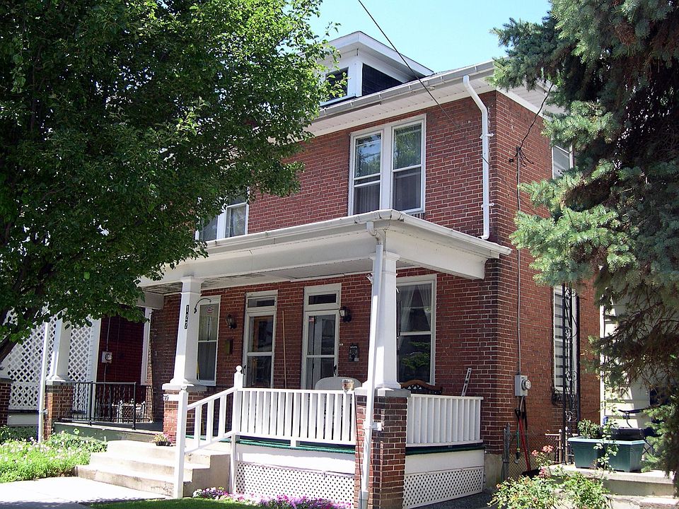 Front of the home with covered front porch 