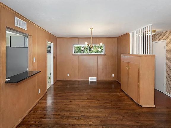 This is the dining room nook, the entryway, and the 'bar area' which goes to the kitchen.