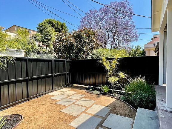 Gated Front Yard With New Landscaping!
