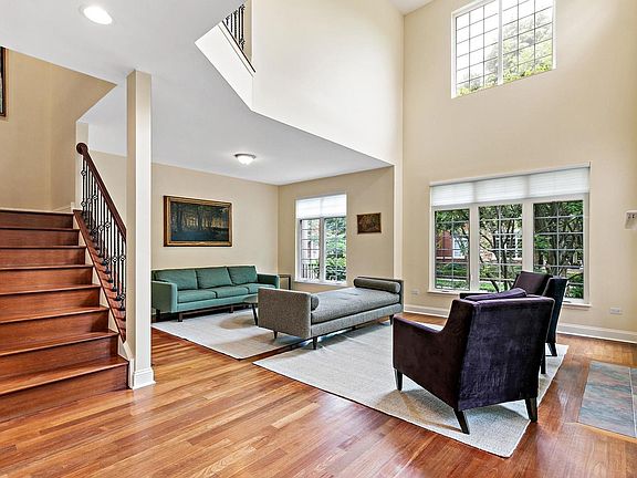 Two story living room with lots of natural light
