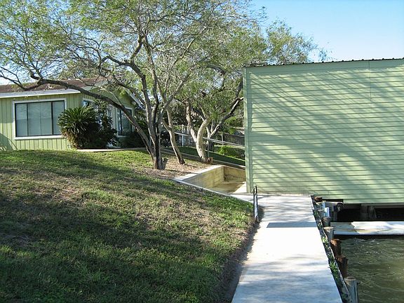 NEW BULKHEAD TREATMENT, LOOK HOW TALL THE BOATHOUSE IS