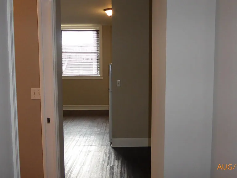 Entry Hallway facing Living Room/Kitchen