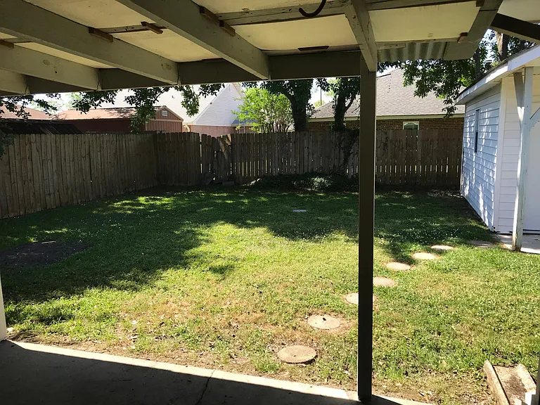View of backyard from the patio