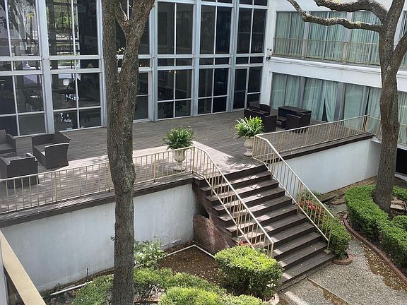 This lovely deck overlooks the courtyard and provides wonderful book reading, coffee spot, or just meeting friends. Quiet and beautiful!