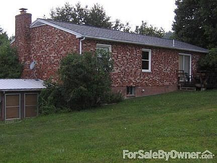 Rear of House
						:
						Small addition to left is where hot tub/jacuzzi is located