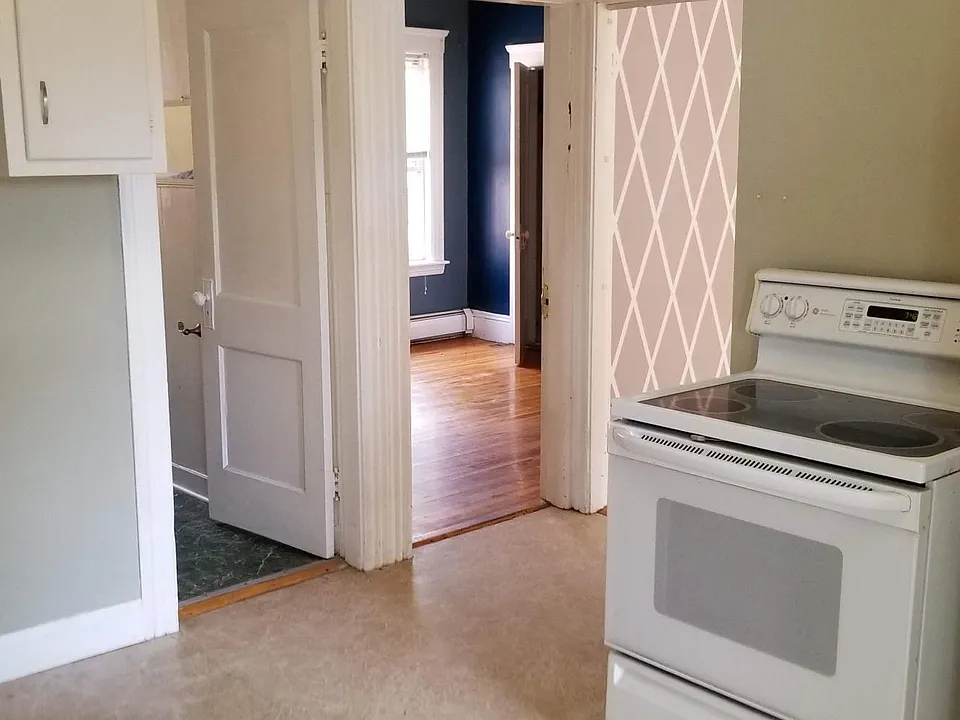 Kitchen view - looking into the bathroom, master bedroom and dining room (flooring has been upgraded).