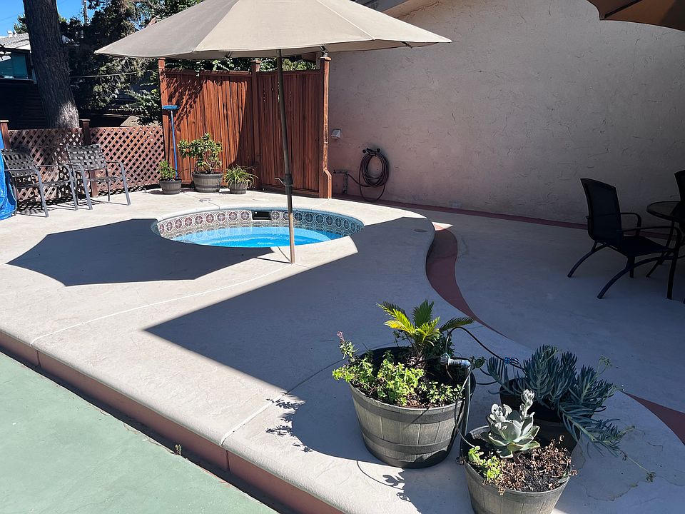 Private back yard terrace and heated in-ground spa