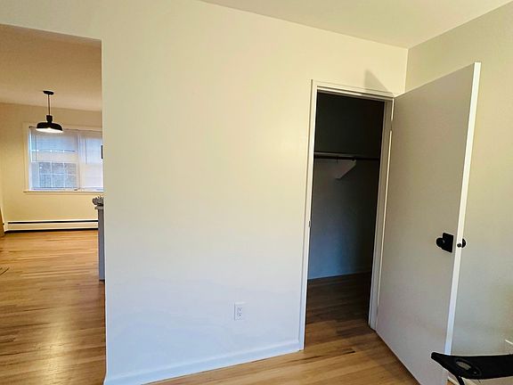 Huge L shaped coat / storage closet as you enter the living room.