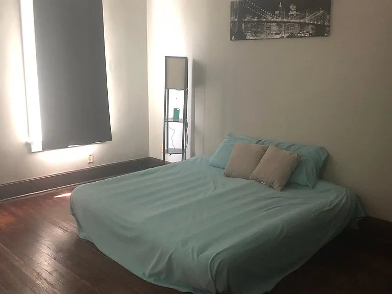 Photo #2 of main level bedroom. 2 large windows in room for sunlight.
