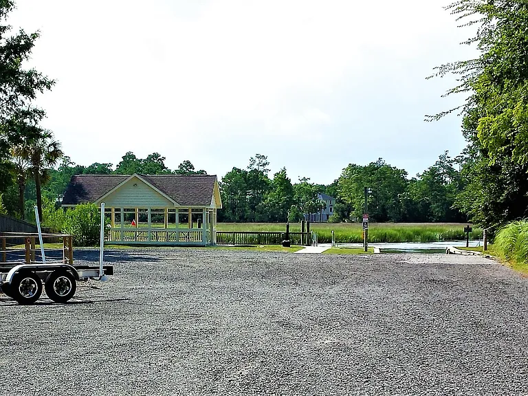 Neighborhood boat ramp, dock picnic shed, and boat/trailer storage area