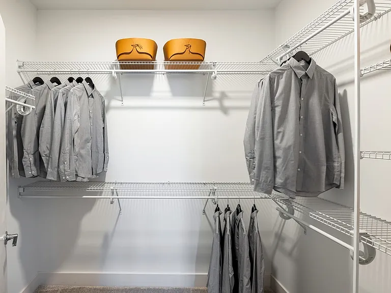 Organize in style with Modera Montville's built-in shelving and spacious linen closets, adding convenience to your living space.