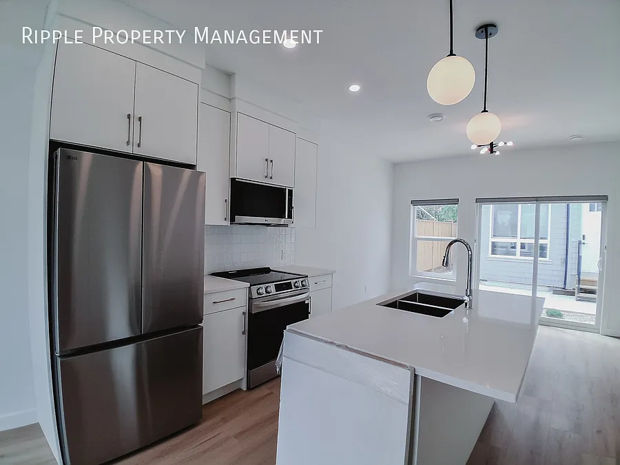 Brand New 3-Bedroom Upper Unit | Bright Corner Lot & Dedicated Garage — Photo 4