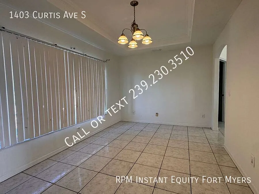 Building Photo - 1403 Curtis Ave S