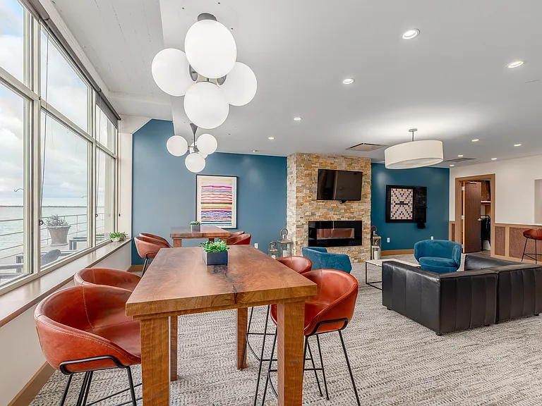 Resident lounge offering stunning waterfront views