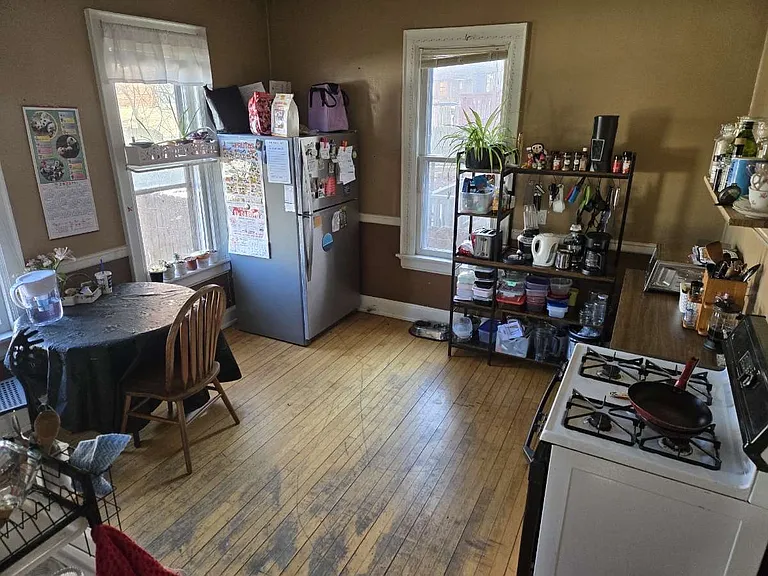 Large kitchen. Kitchen faces the fenced in backyard.