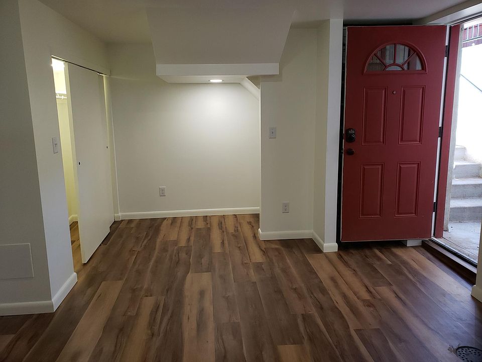 Entrance and living with full closet