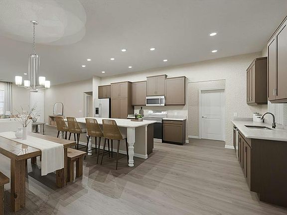 Your new kitchen includes a counter-height island, a hidden pantry, and beautiful finishes. Artist