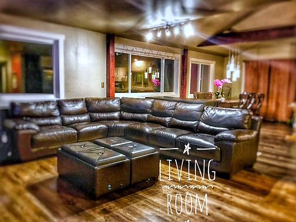 Living space off kitchen and dinning area.