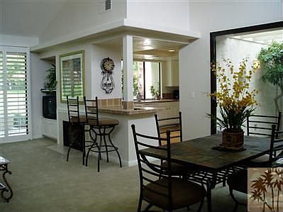 Open and Airy living room/dining room towards kitchen and at