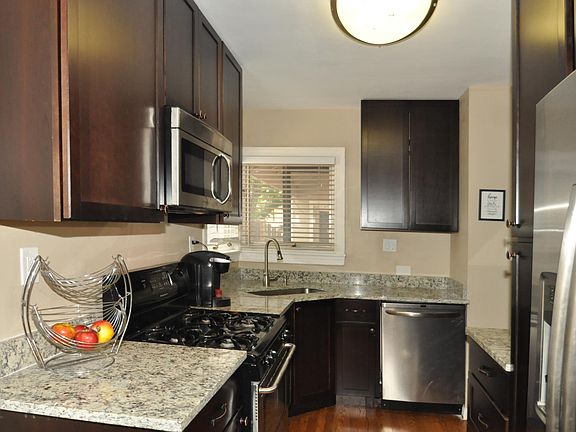 Remodeled Kitchen - Granite tops + 42" cabinets. Counter depth stainless steel refrigerator