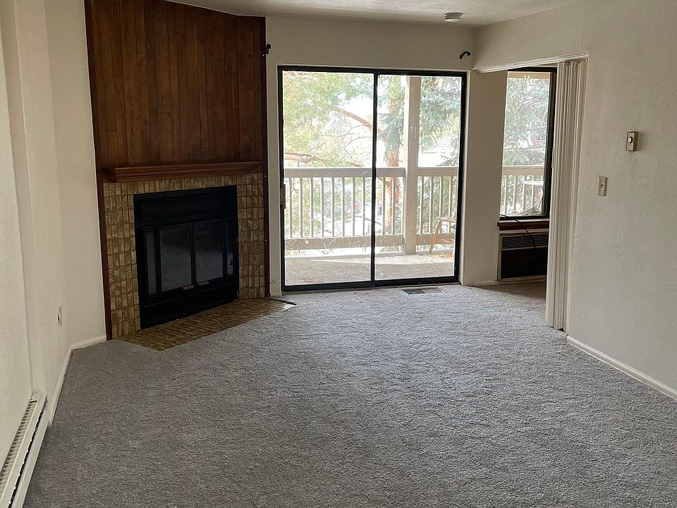 Large Living Room with Fireplace and Balcony with separate storage room