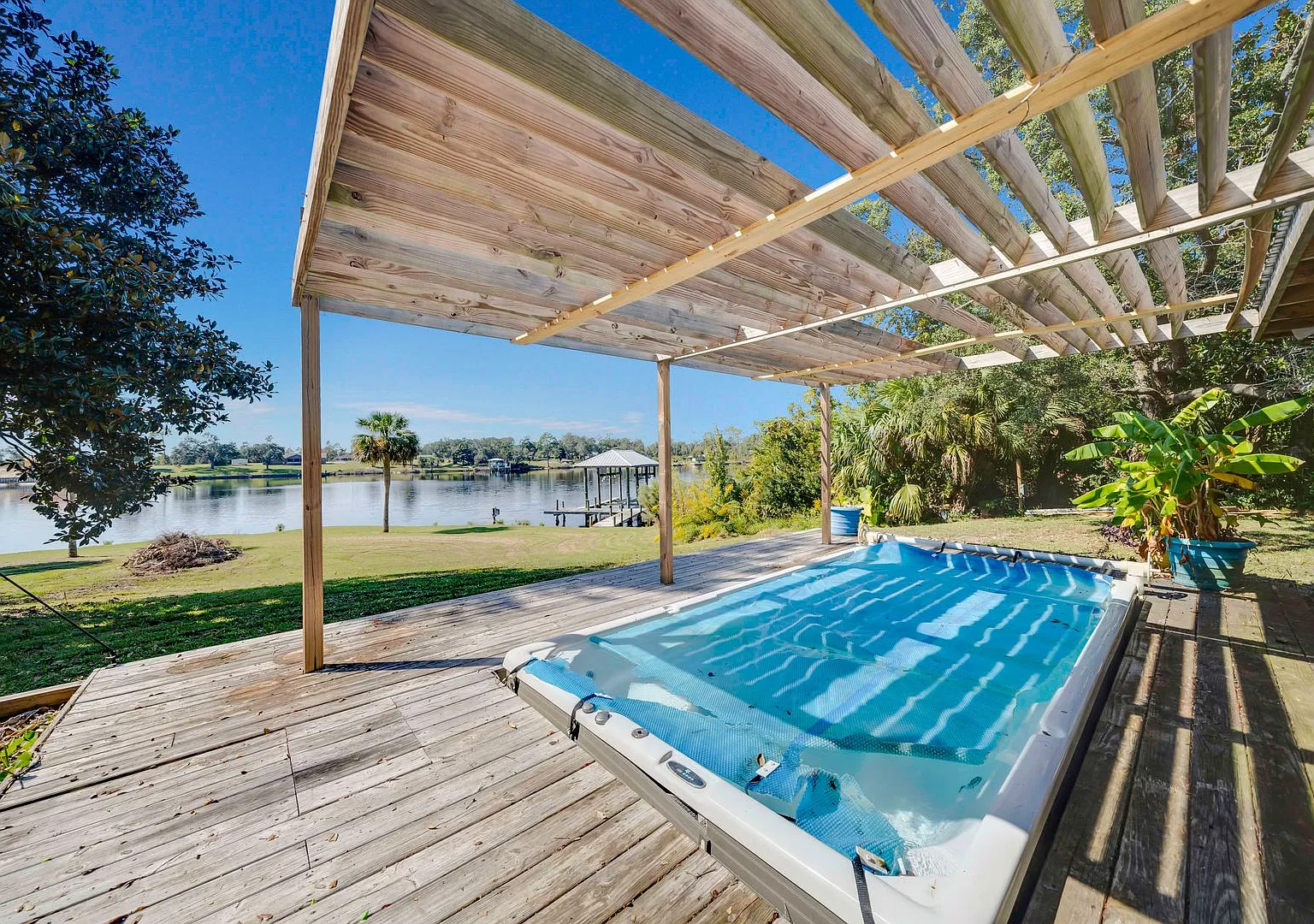Waterfront Retreat with Private Dock, 12,000-Lb Boat Lift, Swim Spa & Luxury Primary Suite! — Photo 4