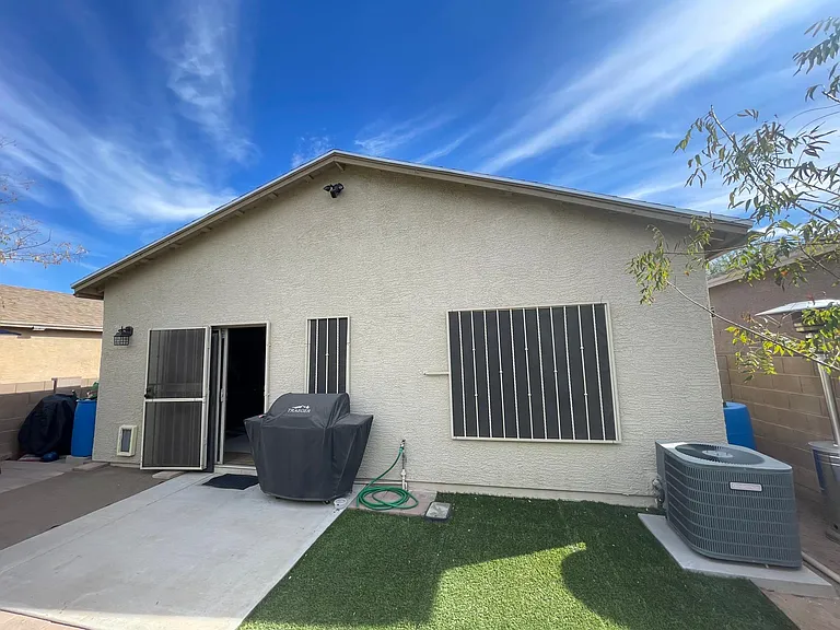 Backyard looking at house