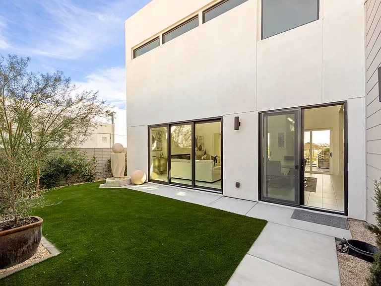This is the front courtyard and entrance to the home. The entrance to the home is through a door on the right side!