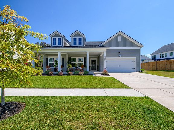 Front View with Easement on all three sides of the property. Not close to your neighbors!