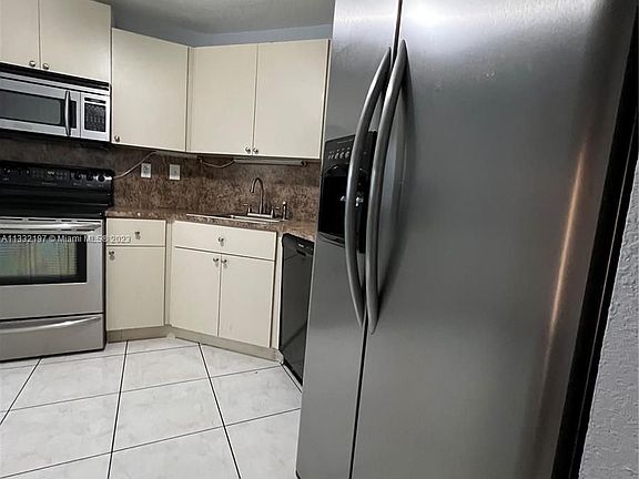 5th image of 10018 Hammocks Blvd APT 104-5