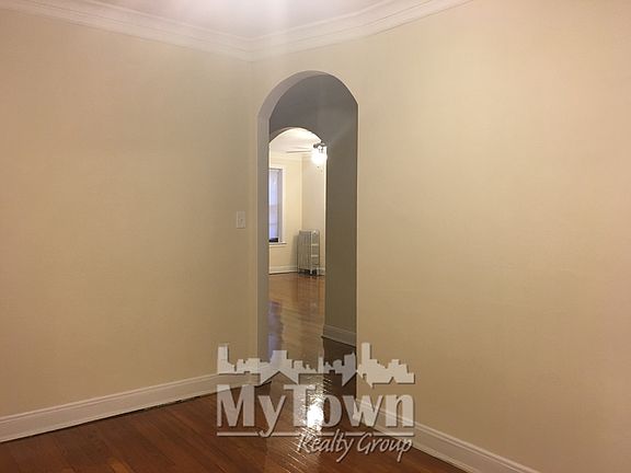 Dining room,with arch to living room