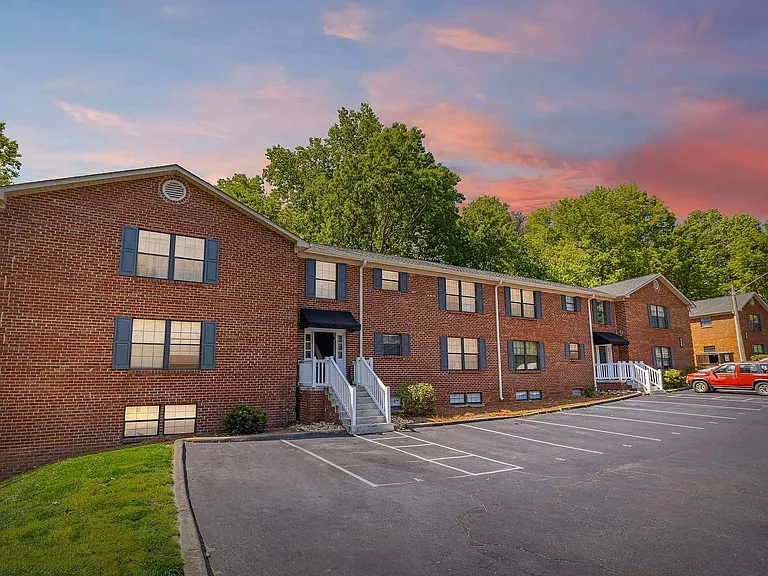 Charming brick apartment community with convenient parking and easy accesscomfortable, pet-friendly living