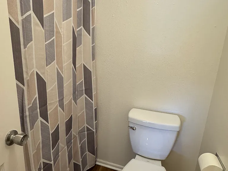 New toilet, new flooring and new tub surround.