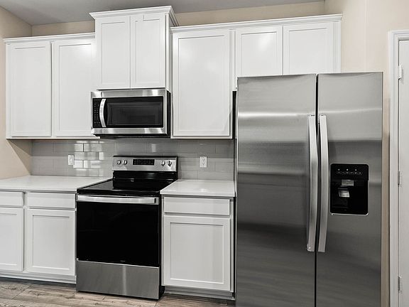 The heart of the home features all new Whirlpool R appliances