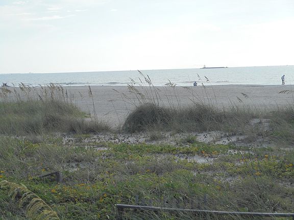 Lots of beach, sand, and sun! Catch a ride on that sub out there!
