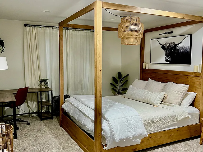 Bedroom 2 complete with king bed, closet and work area
