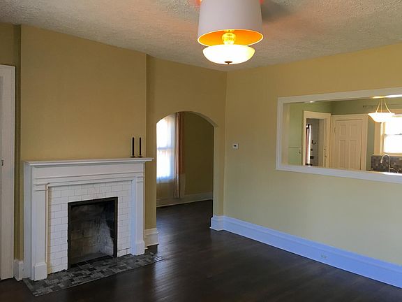 living room opens to the dining room, kitchen and an office