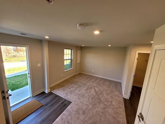 Main level foyer: Room for office/ 2nd LR or play area. Walk out to garage