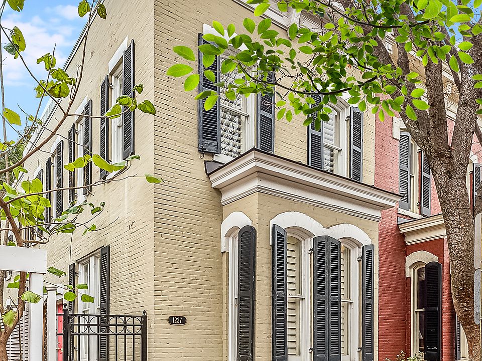 Picturesque Georgetown end unit renovated rowhouse with lots of large windows and upgrades galore!