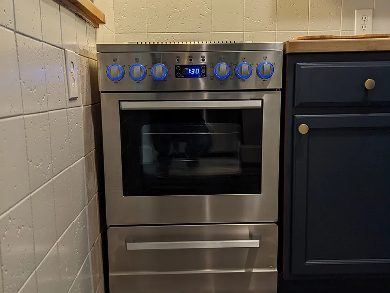 Modern stainless steel oven and range.