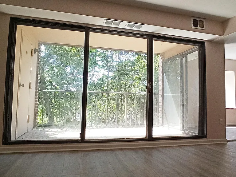 Balcony accessible by wall to ceiling windows in the Living Room and kitchen.