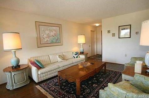 Nice size living room with hardwood floors and great views