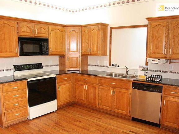 Eat-in Kitchen with plenty of storage and granite counters.