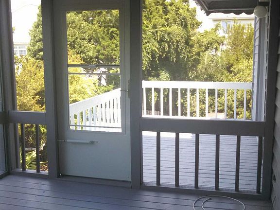 FRONT DECK FROM SCREENED PORCH.