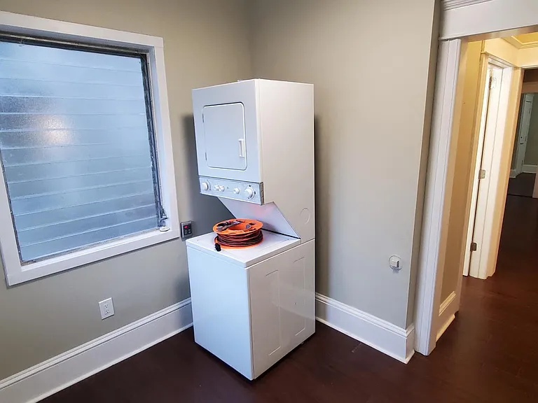 Utility Room and Rear Entrance, view to Hall Bathroom and Kitchen