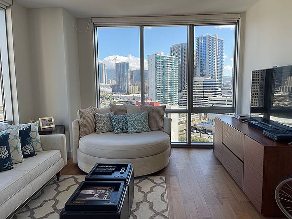 Living room w/auto shades