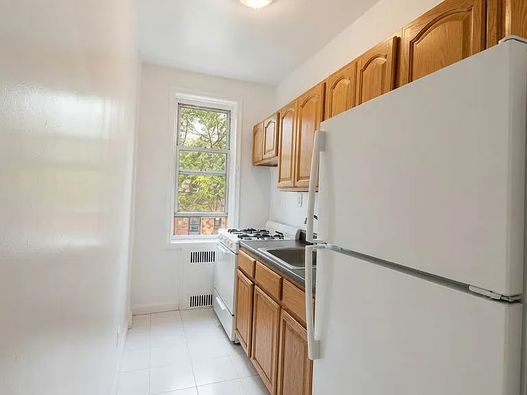 9216 Whitney Ave #203 — Photo 5