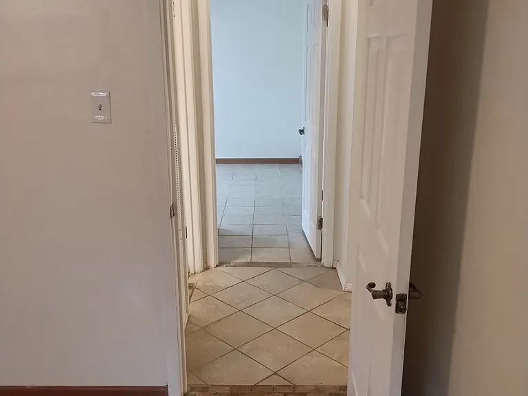 From Front Bedroom looking through hallway into Middle Bedroom.
