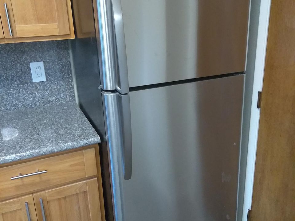 Kitchen with refrigerator