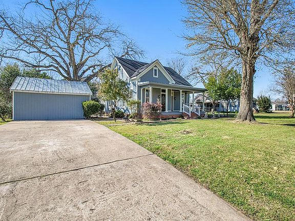 A double-wide driveway allows plenty of parking for residents and guests alike and can easily be converted back to a garage to park your car!